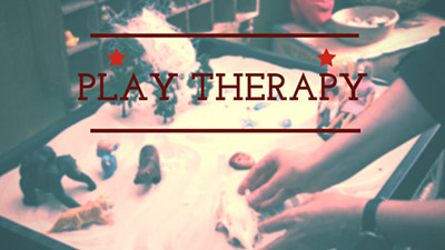 Play Therapy with children using toys and sand tray